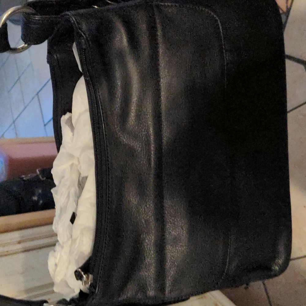 Stone mountain black leather shoulder bag with two outside pockets